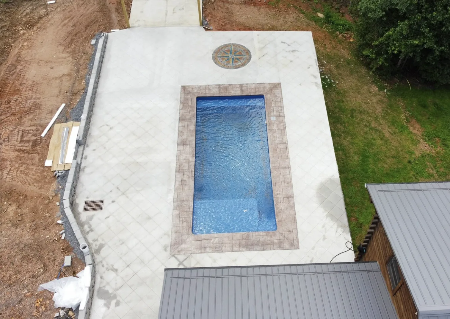 Aerial Pool Deck Stamped Concrete — Platinum Construction & Crane