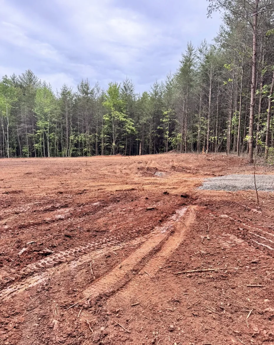 Cleared and graded homesite with fresh earthwork