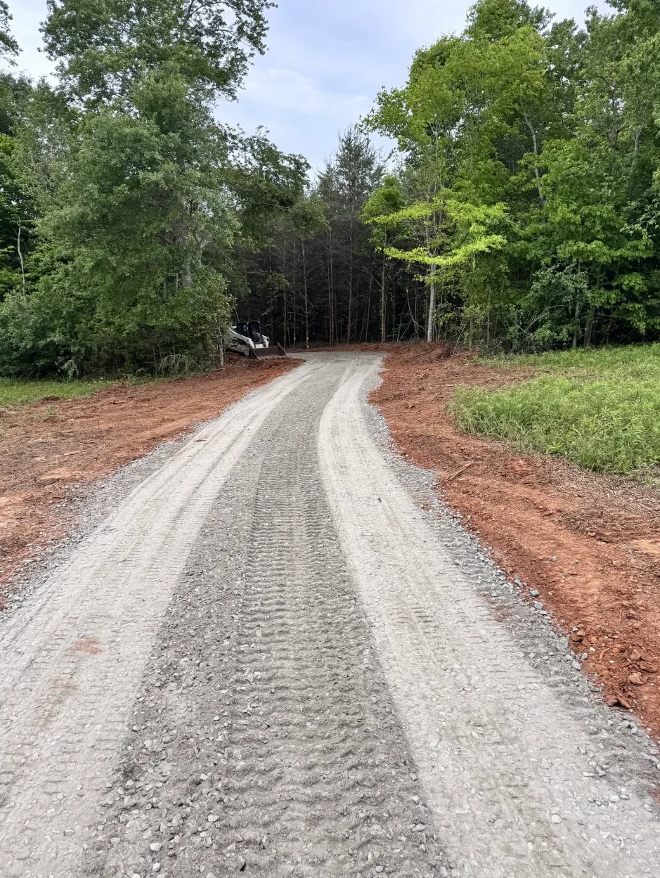 Finished Gravel Driveway Curve — Platinum Construction & Crane